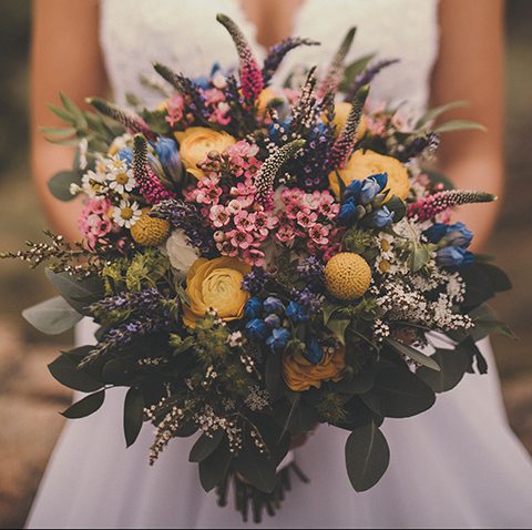 Bride's colorful bouquet designed for her Laramie WY wedding photos