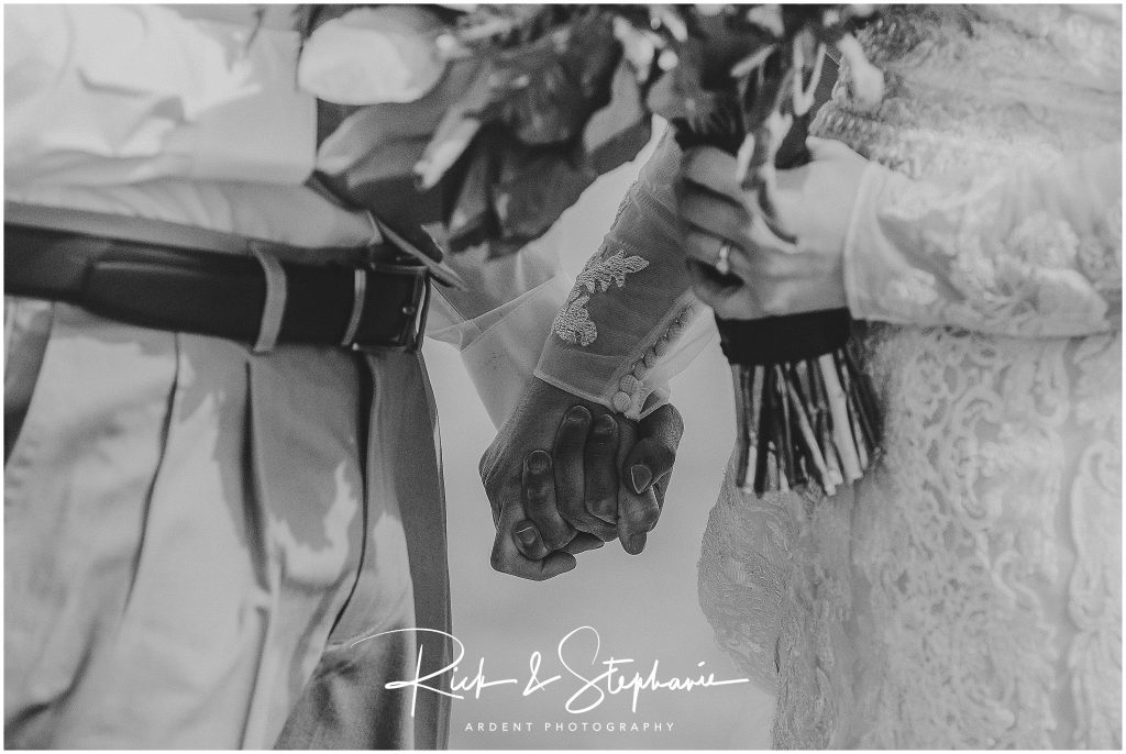 Couple holding hands as they get ready for their Wyoming Wedding.