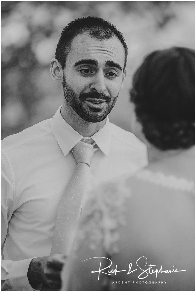 Groom reciting his vows to the bride during their Wyoming wedding in Vedauwoo.