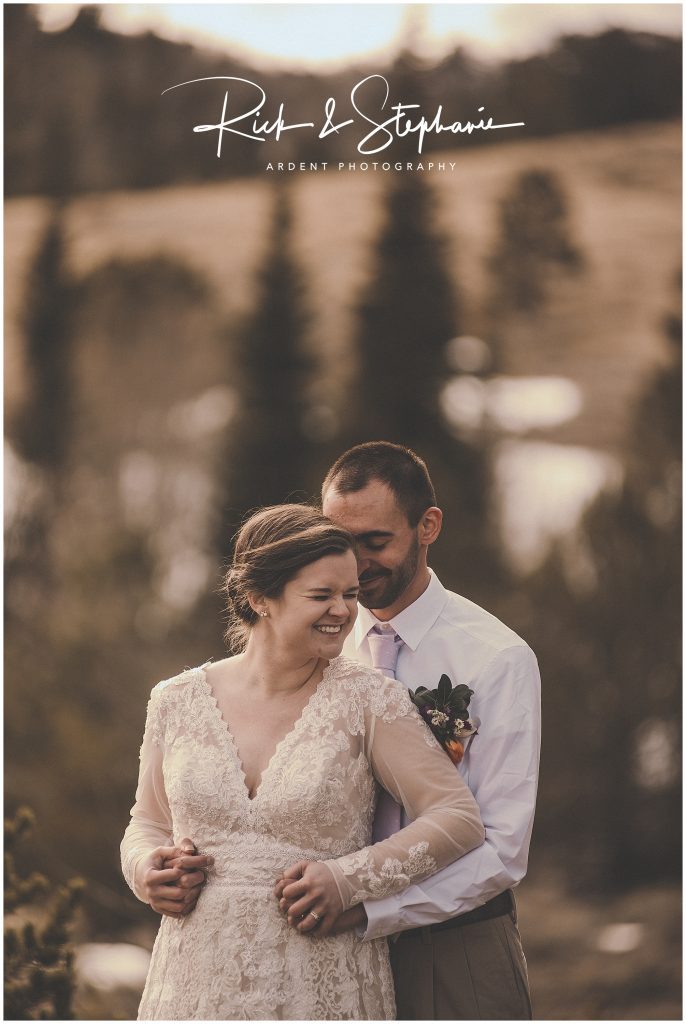 Wyoming wedding in Vedauwoo featuring a bride and groom laughing during their bridal formals.