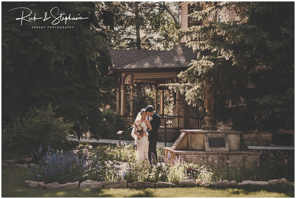 Ivinson Mansion wedding formal portraits of the bride and groom on the venue grounds.