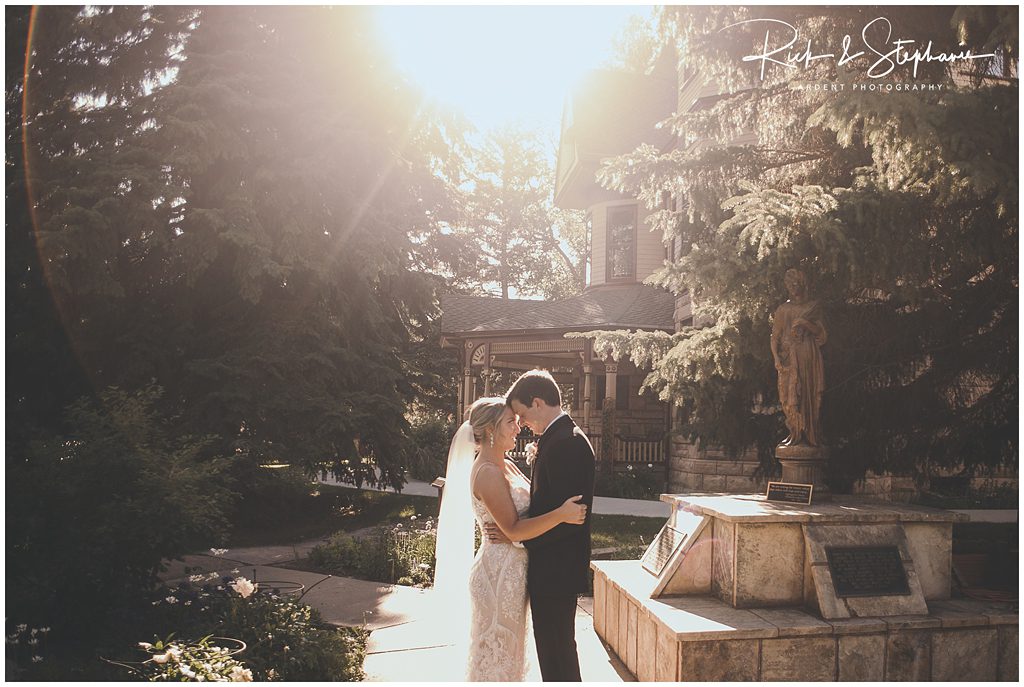 Gorgeous sunlight streaking in for this photo of the bride and groom during their Ivinson Mansion Wedding.