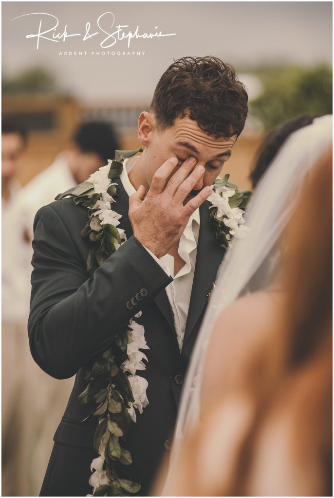 Emotional groom during his wedding ceremony crying after seeing his Bride in Wyoming